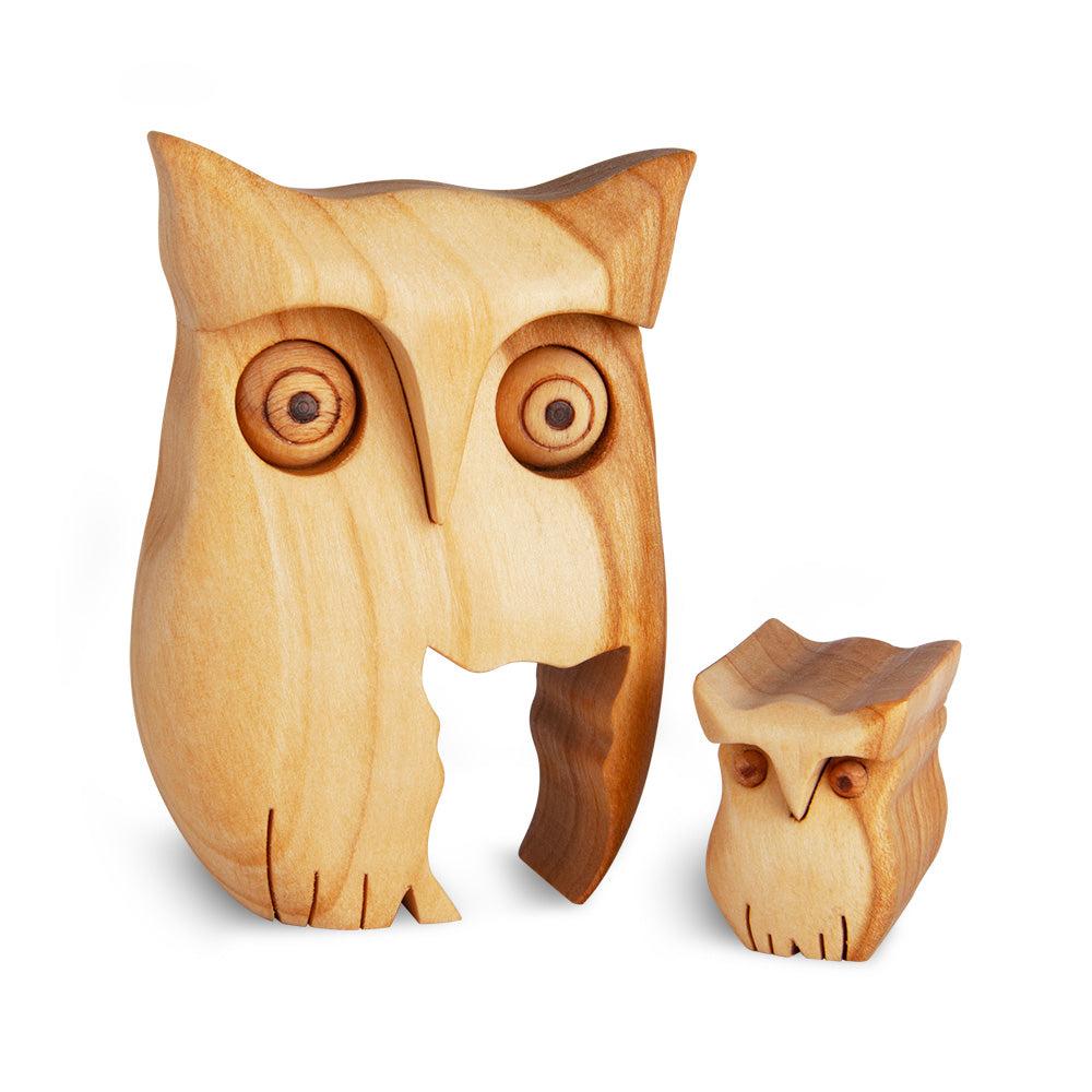 Eule aus Holz mit Kind